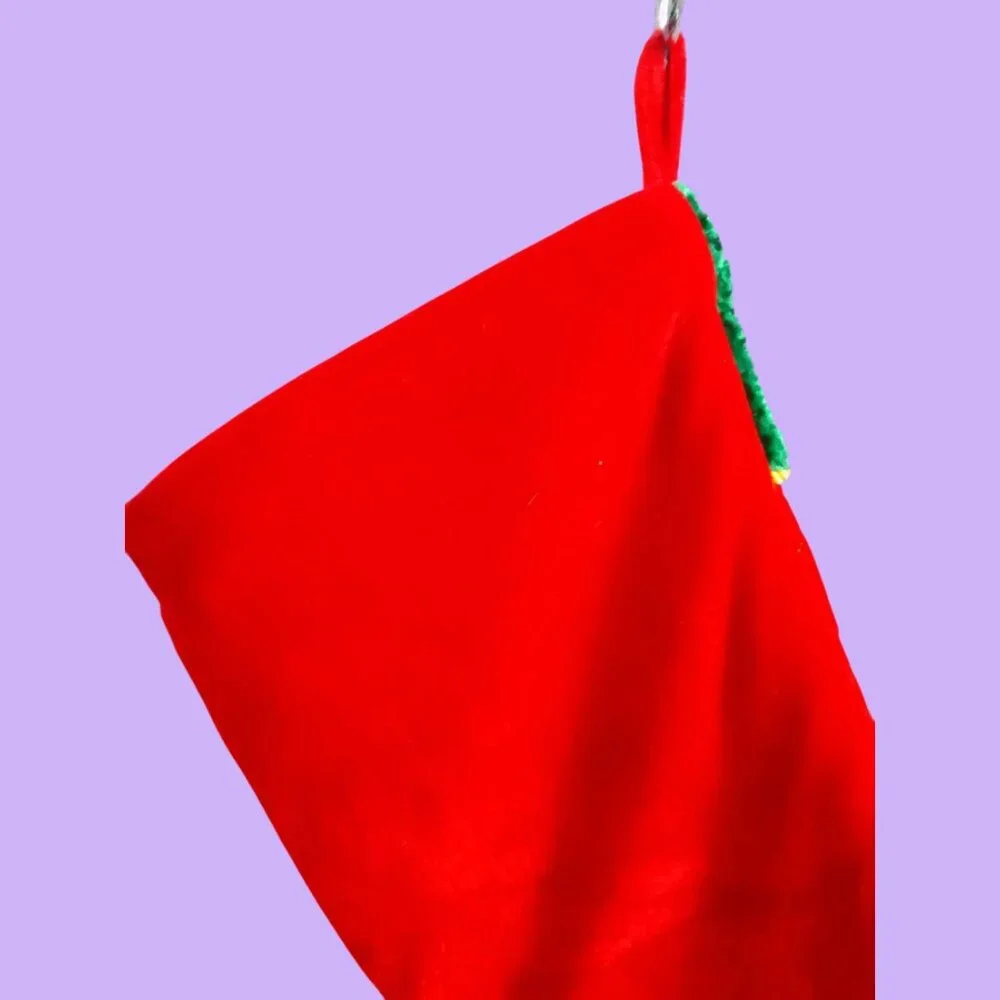 Oversized Christmas festive embellished holiday stocking in red, green and gold
